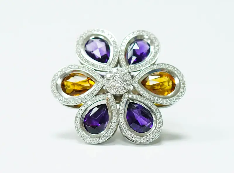 Flower-shaped cocktail ring with amethyst and citrine stones