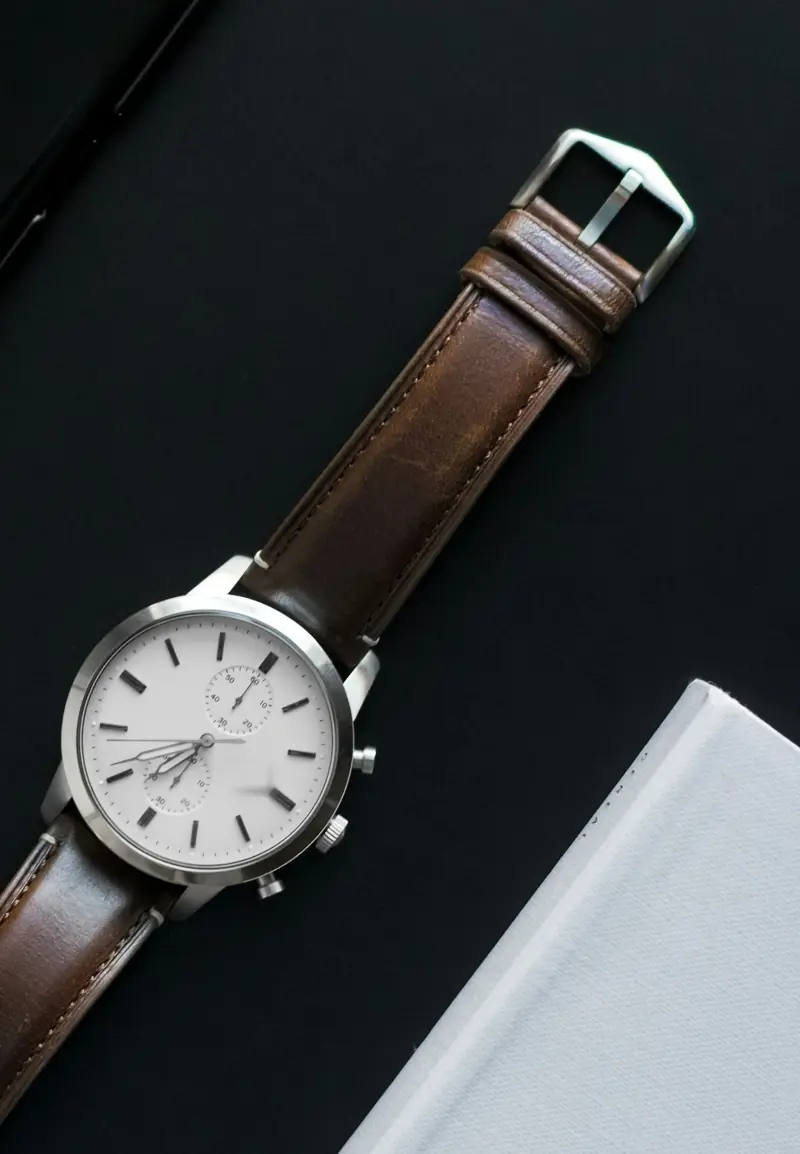 Brown leather watch strap with steel buckle
